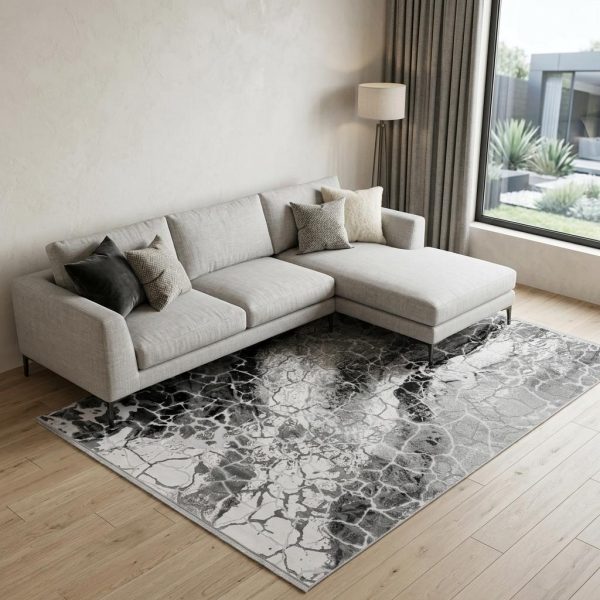 7' X 10' Black And Gray Abstract Area Rug With Fringe