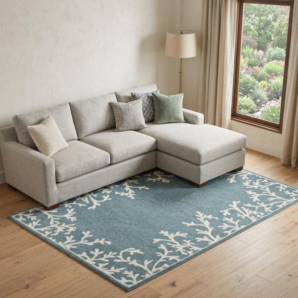 8' X 10' Blue And Ivory Seashell and Coral Area Rug