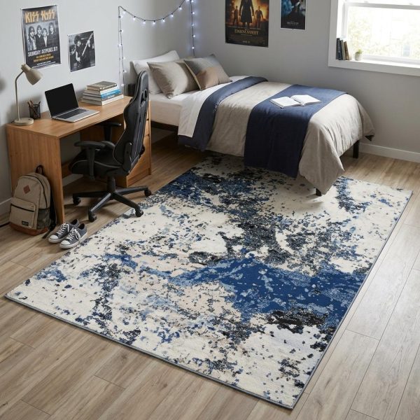 5' X 7' Blue Black Beige And Ivory Abstract Area Rug